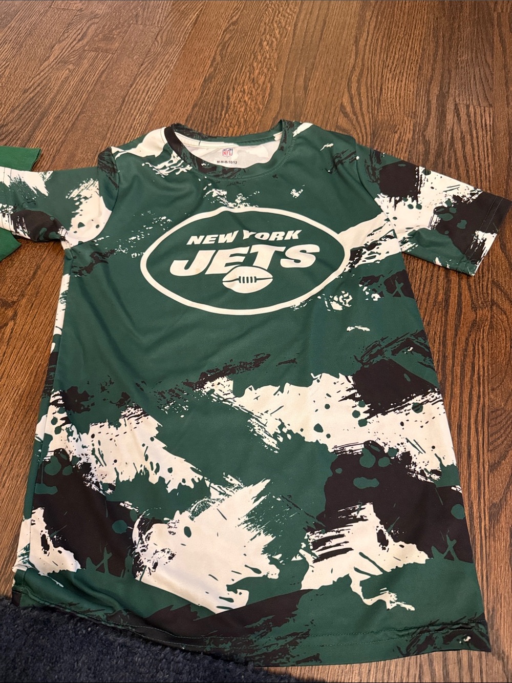 NFL Green and White Logo Crew Neck Tee- tech material